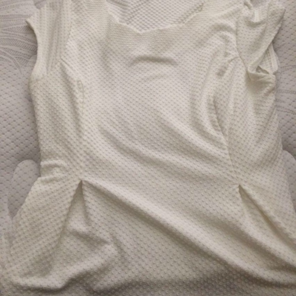 White peplum top